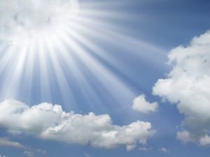 sun-rays-coming-out-of-the-clouds-in-a-blue-sky